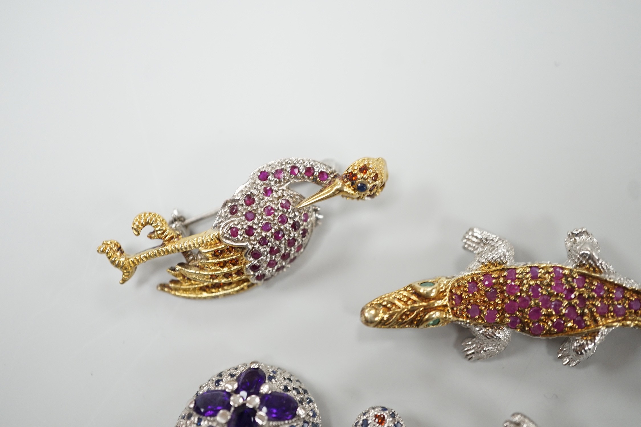Four assorted modern white metal and coloured paste set miniature animal brooches, three stamped 925, including frog, crane, tortoise and crocodile.